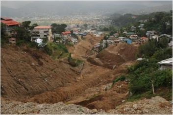 Photo 2: Conditions downstream of the La Trinidad landslide, and the disaster region